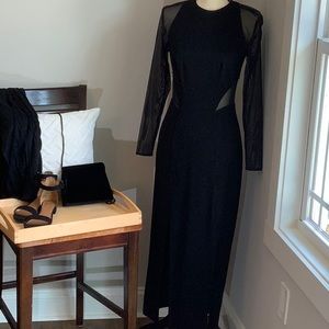 Tadashi black stretch fabric and mesh long-sleeve black evening/cocktail dress.